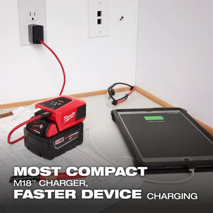 Milwaukee M18 TOP-OFF charging a tablet from a wall outlet